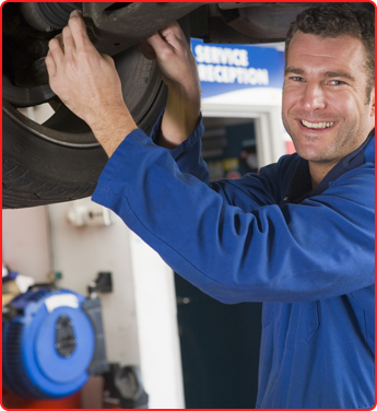 Man Working On a Cars Suspension in Des Plaines, IL